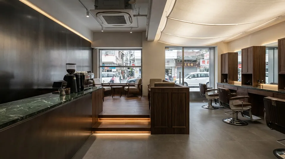 Café and Barbershop: Zoning Through Levels and Materials