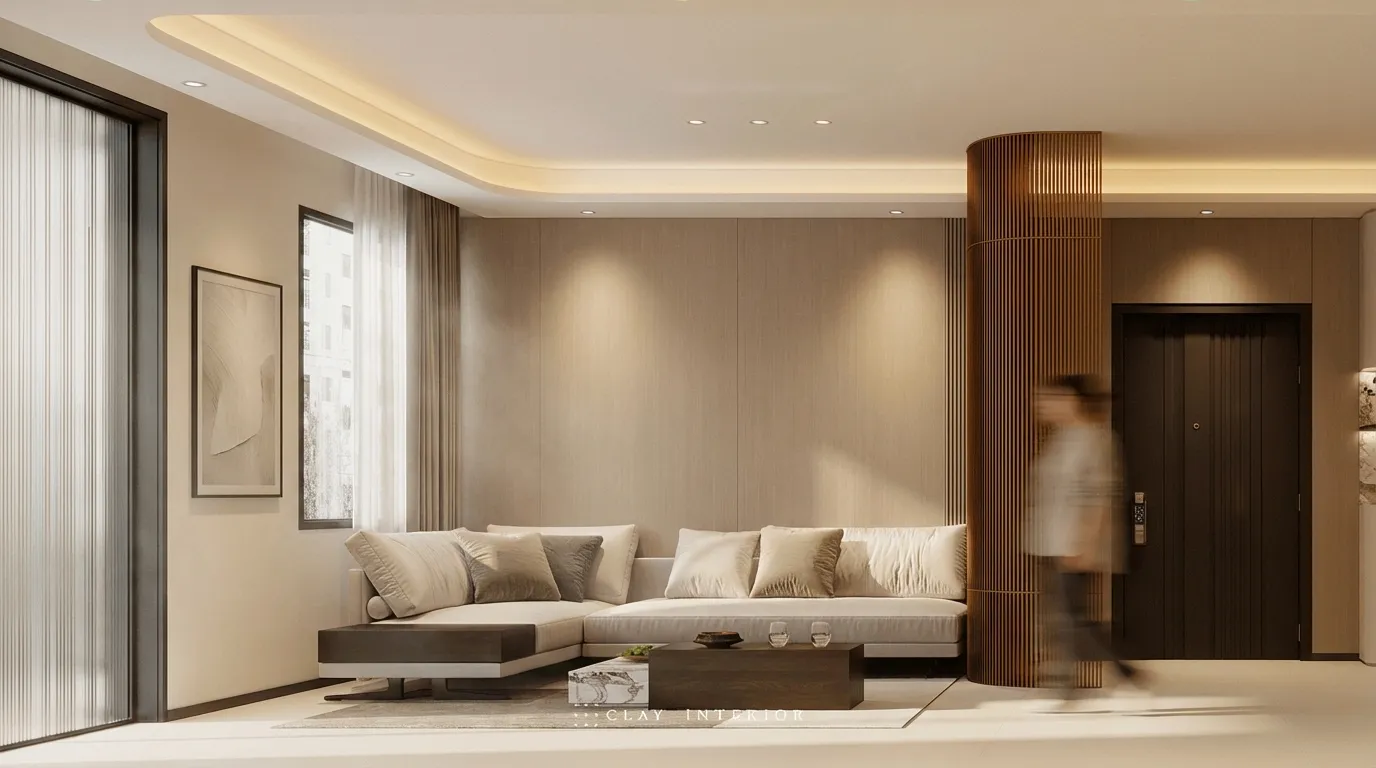 Living room L-shaped sofa and wood-slat entrance column leading to the front door