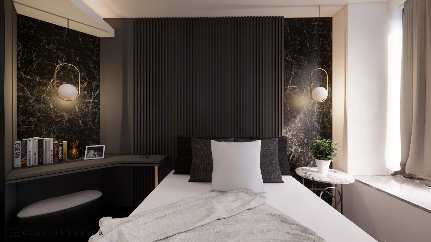 Bedroom headboard wall with vertical-channel upholstery, marble cladding, and a pendant light