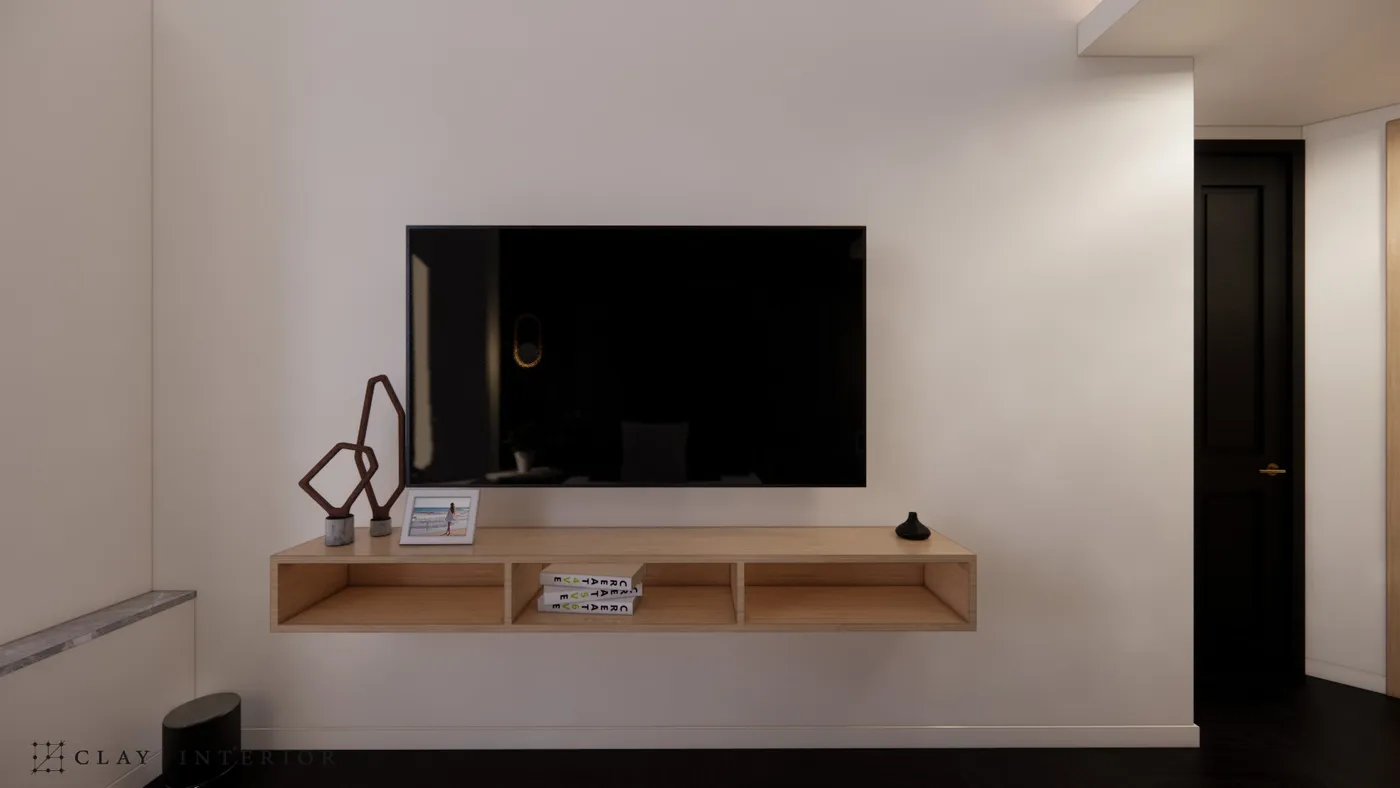 Bedroom TV wall with a floating wood-grain low cabinet and minimalist styling