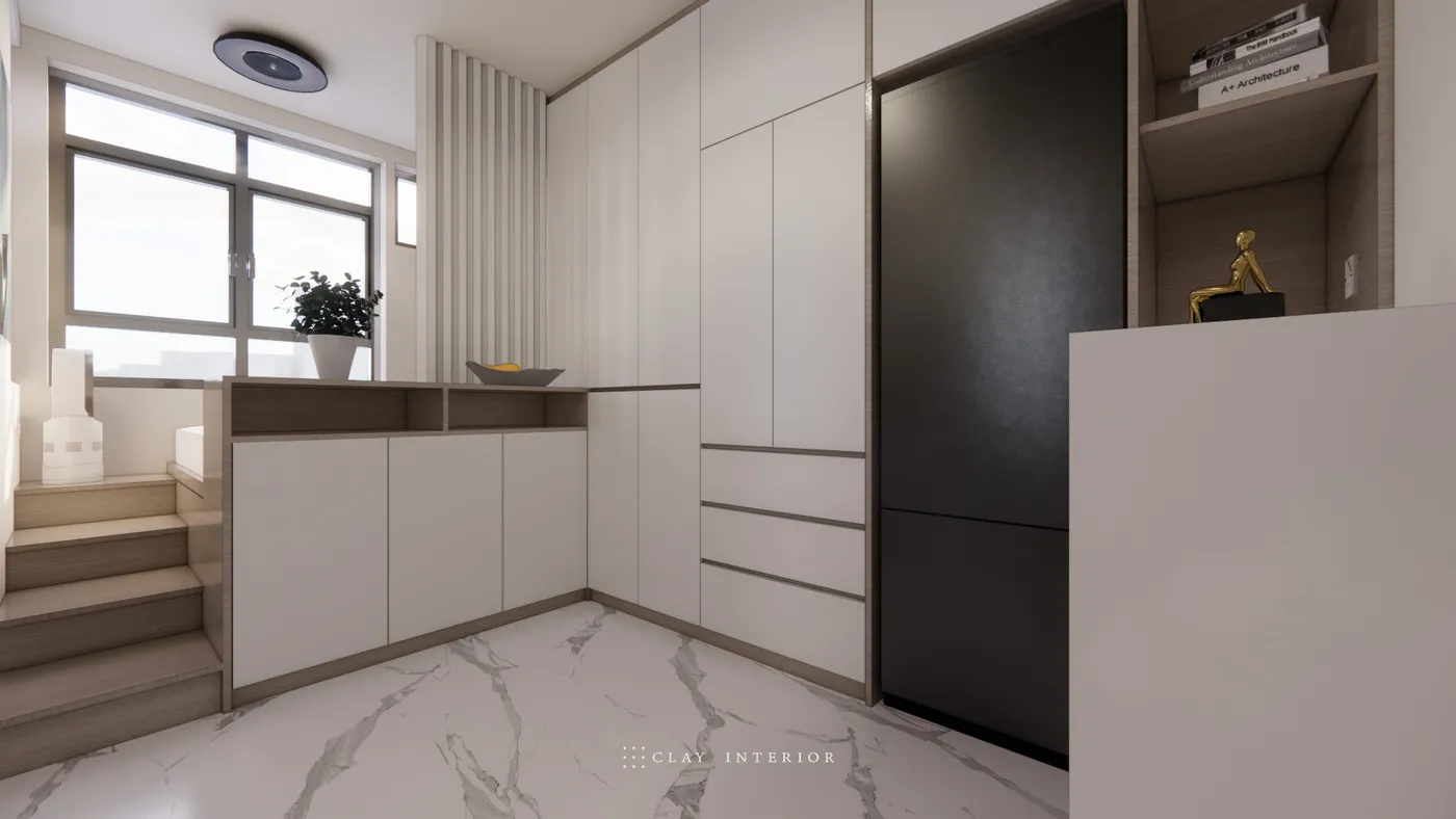 Storage cabinet and shelving at the stair landing, with black fridge built into the wall