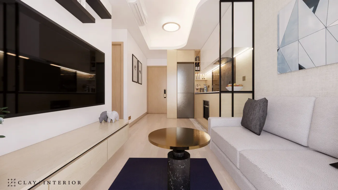View from the living room toward the kitchen and entrance corridor, with a black-framed glass sliding door as divider