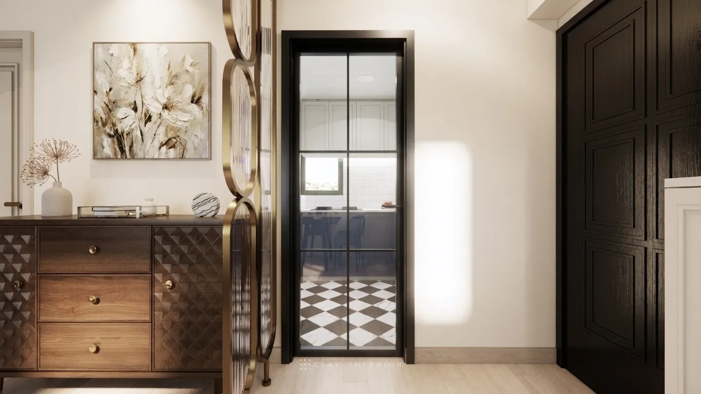 Entrance hallway with a black-framed glass sliding door, black-and-white diamond-patterned floor tiles, a dark wood-grain chest of drawers and a wrought-iron screen