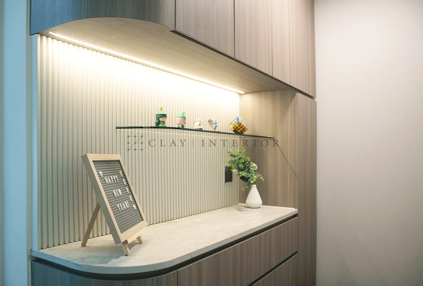Detail of the entryway storage cabinet, wood-line cabinet body with shelf lighting