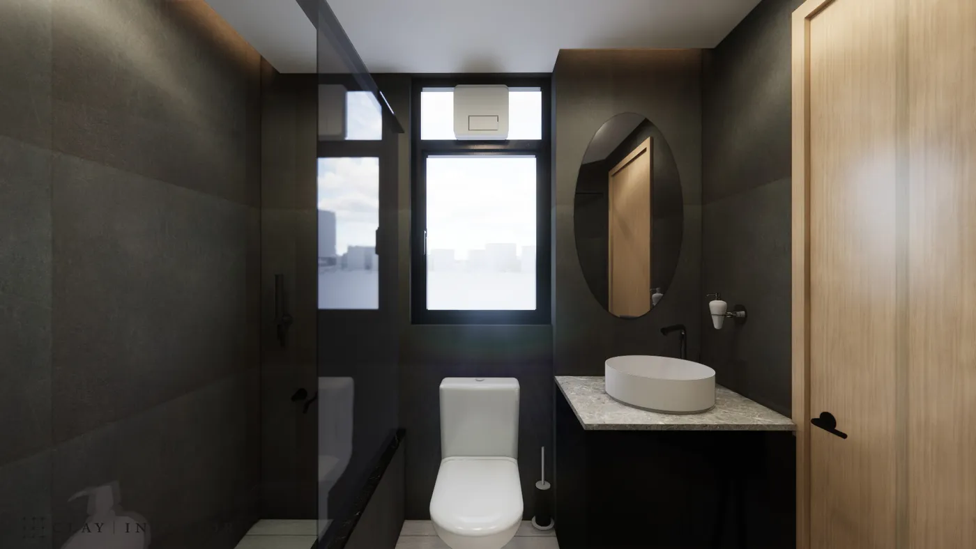 Bathroom with matte dark tiled walls, a black vanity counter, and an oval mirror