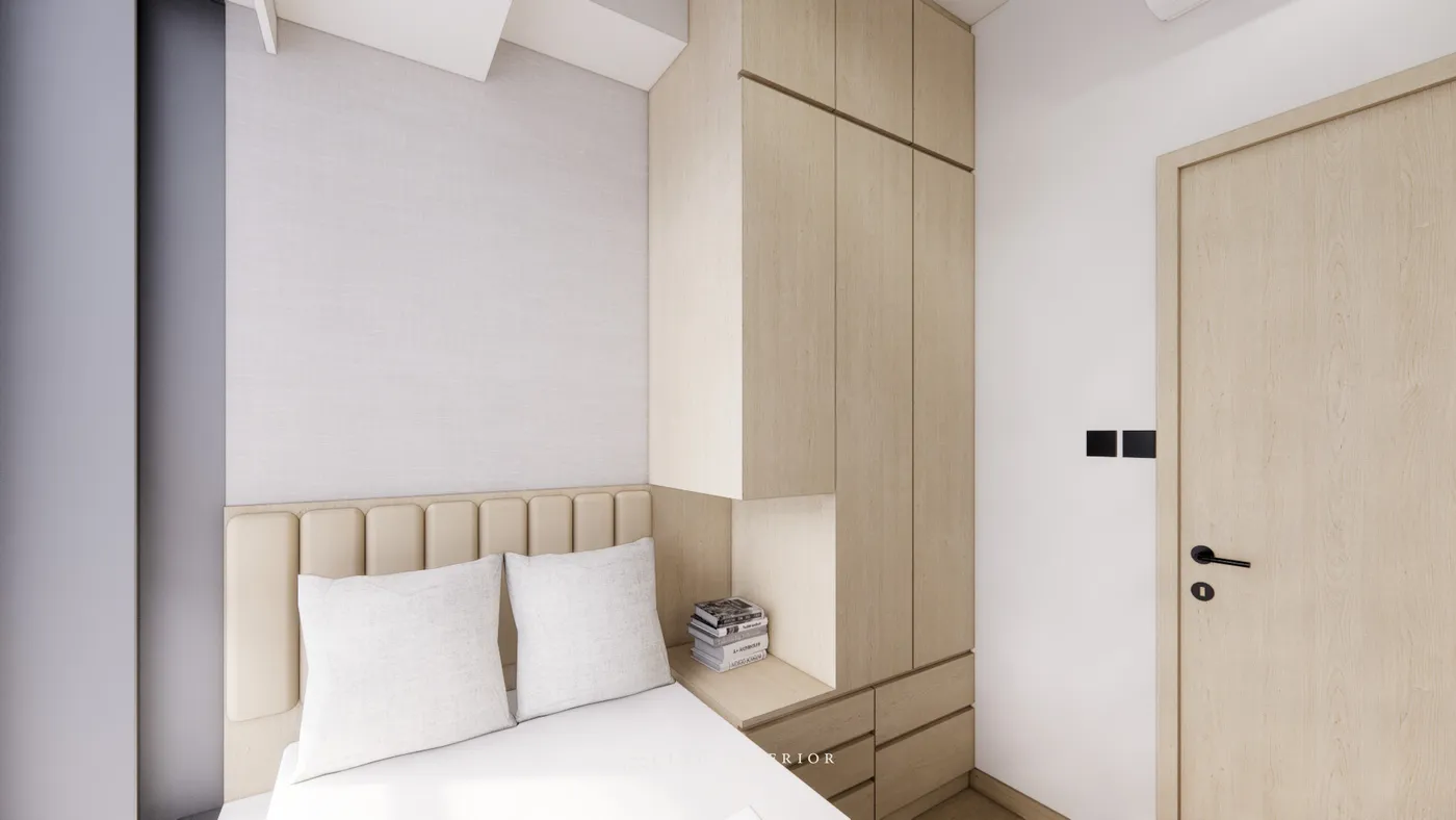 Bedroom with upholstered headboard and full-height wood-grain wardrobe