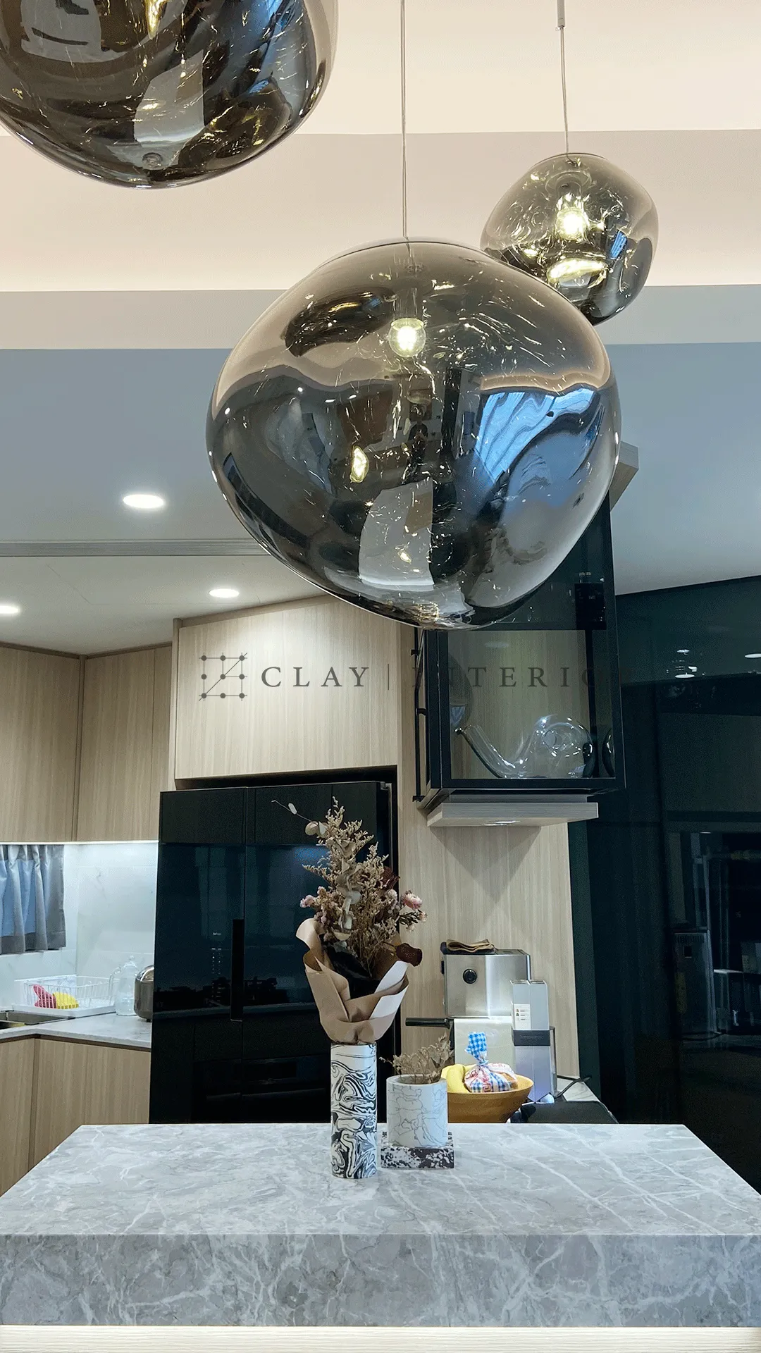 Close-up of the pendant light above the kitchen island