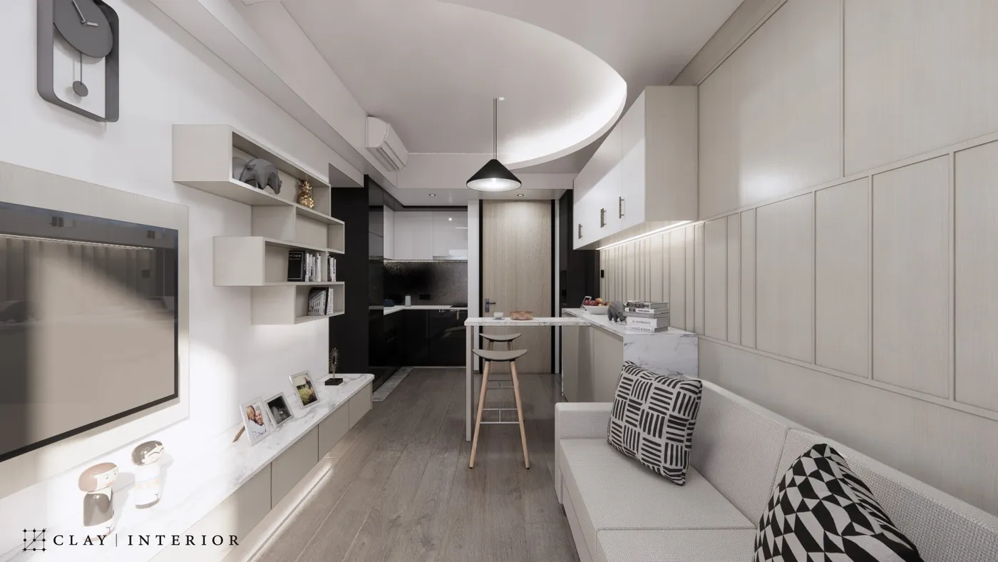 Living room with a dining bar and open-plan kitchen, under a curved ceiling feature with a pendant light